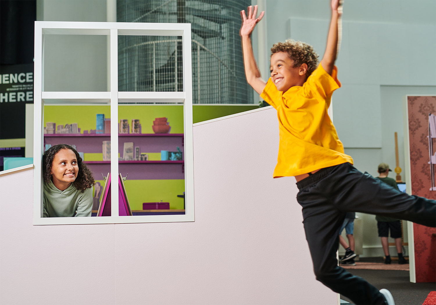 A child jumps in Heureka’s AI exhibition.