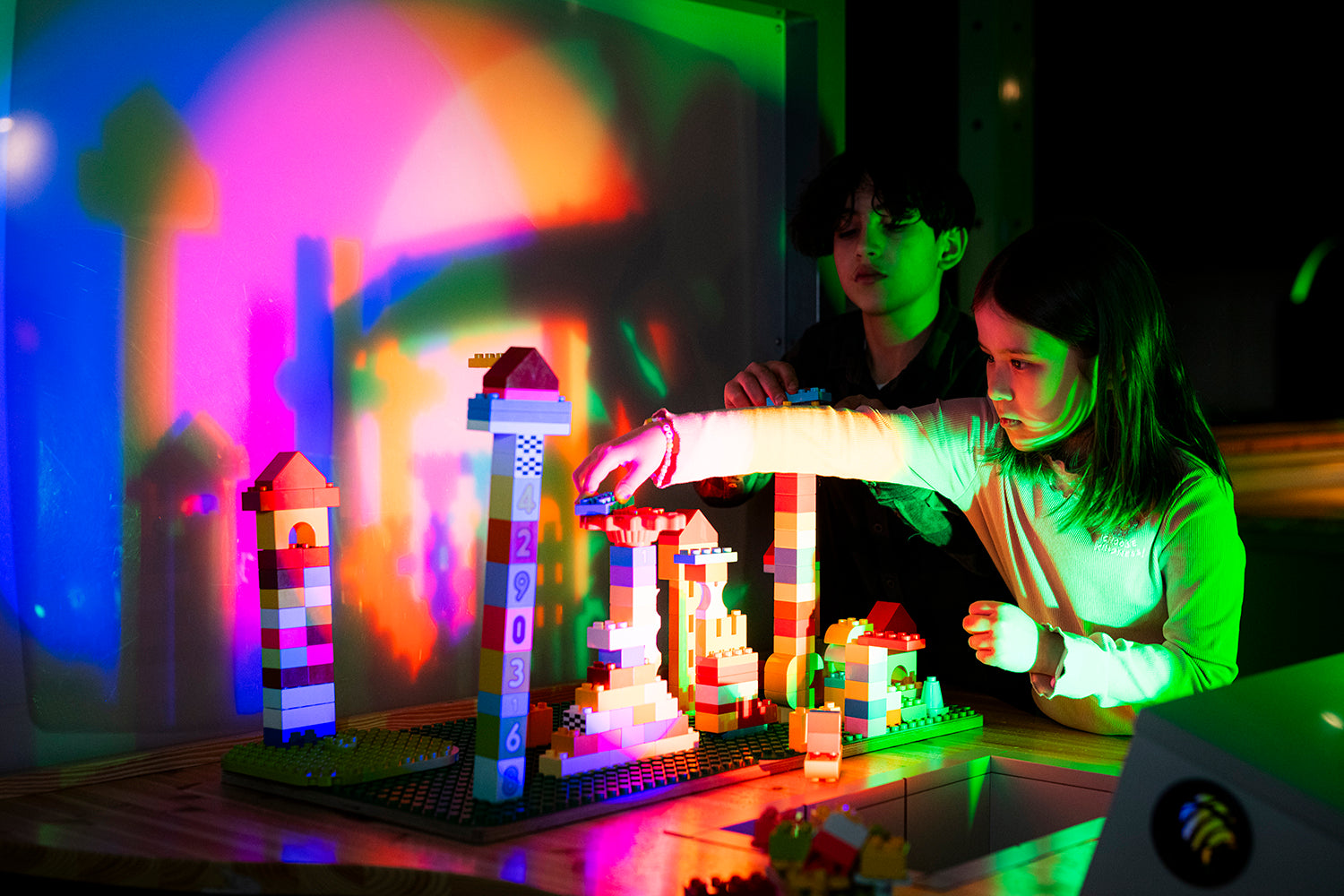 Children building with Lego at Heureka's Shadow Theater.
