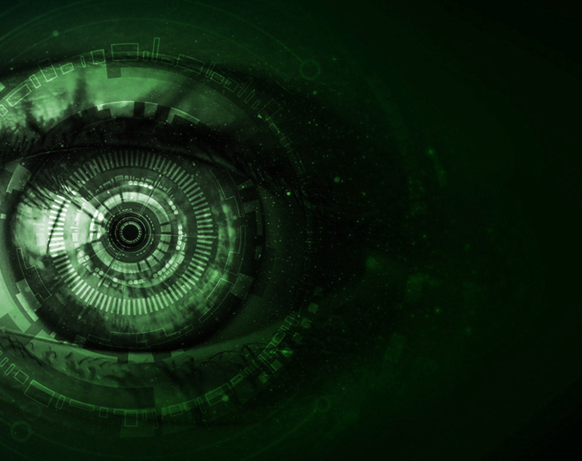 Kuvistuskuva vihreästä silmästä, jonka yksityiskohtana on robottimainen tesktuuri.
