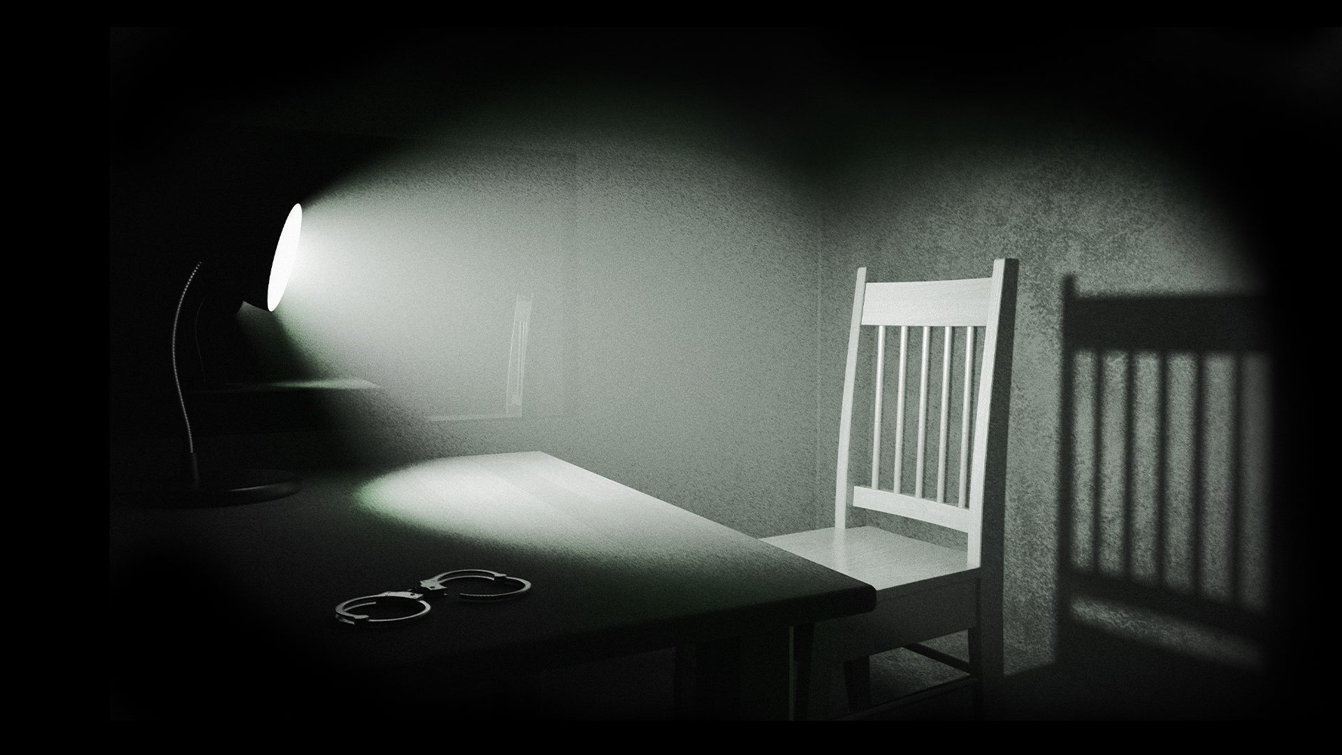 Kuvituskuvassa pöytä, jonka päällä on käsiraudat sekä tuoli, jota valaisee pöydällä oleva lamppu.